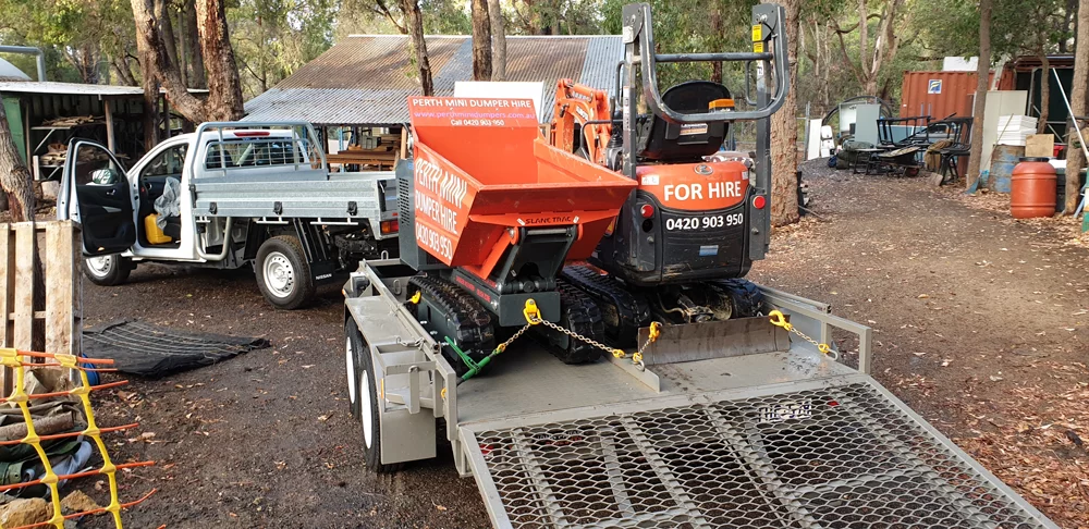 Mini excavatr and dumper in the bush