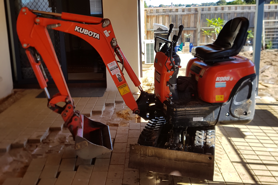 Mini excavator with no rollcage fitted