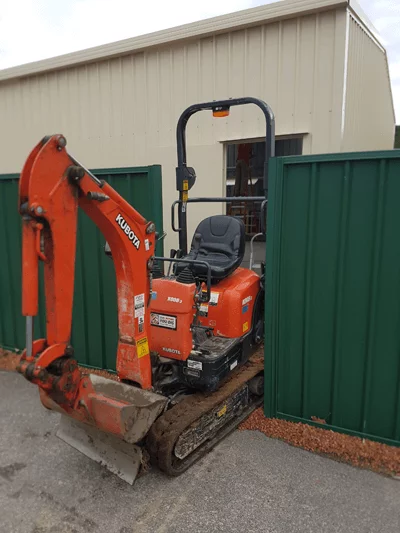 mini excavator fits through gates